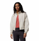 a women wearing a beige Amazestretch Jacket