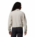 a women wearing a beige Amazestretch Jacket