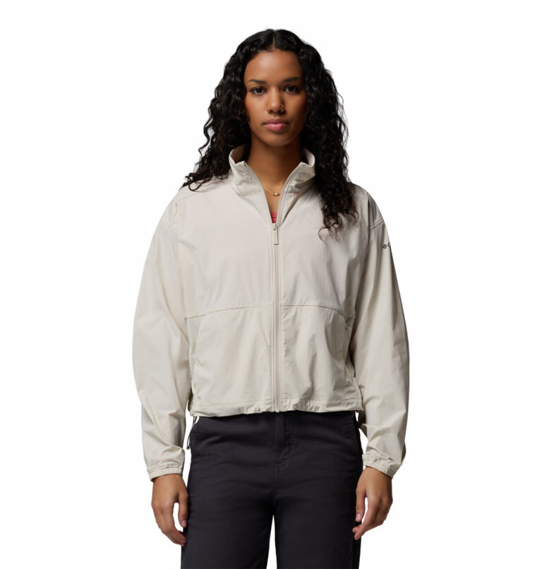 a women wearing a beige Amazestretch Jacket