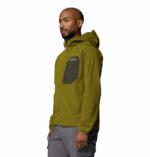a man wearing a green Tall Heights III Softshell Jacket