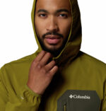 a man wearing a green Tall Heights III Softshell Jacket