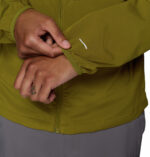 a man wearing a green Tall Heights III Softshell Jacket