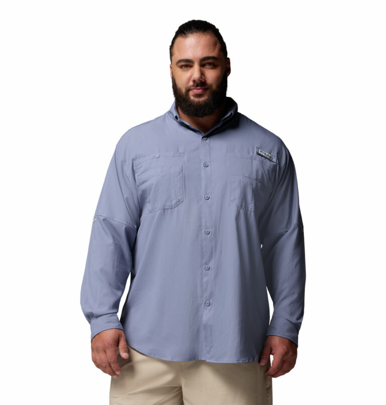 a man wearing a purple Tamiami II Long Sleeve Shirt EXT