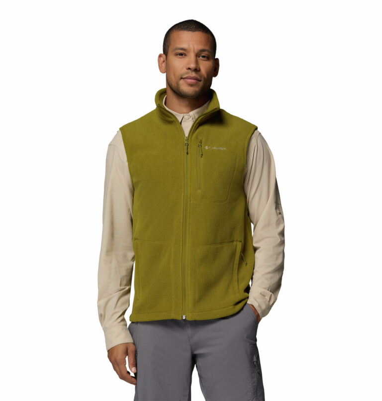 a man wearing a green Fast Trek Fleece Vest
