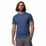 a man wearing a blue Zero Rules Light Short Sleeve Crew