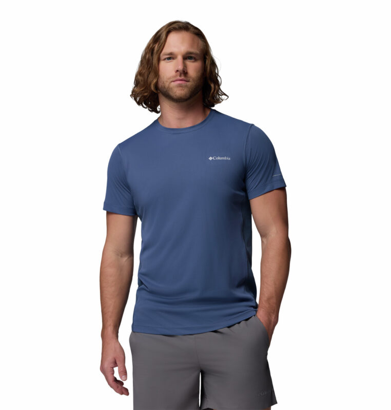 a man wearing a blue Zero Rules Light Short Sleeve Crew