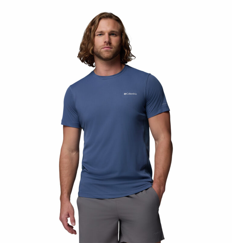 a man wearing a blue Zero Rules Light Short Sleeve Crew
