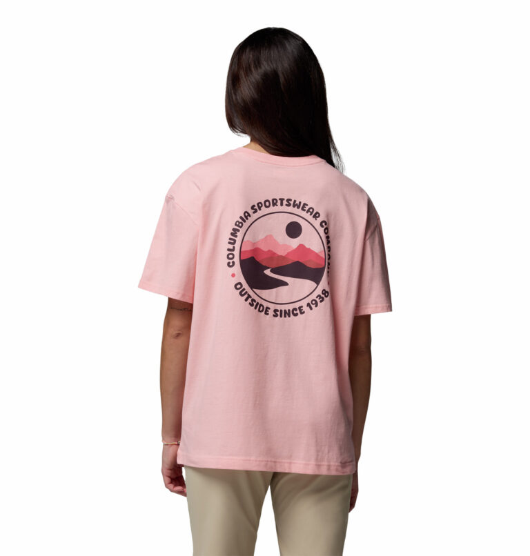 a women wearing a pink Rolling Bend Graphic Tee