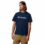 a man wearing a blue CSC Basic Logo Short Sleeve Tee