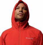 a man wearing a orange Trailborne Jacket