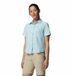 a women wearing a blue Silver Ridge Utility II Short Sleeve Shirt