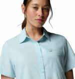 a women wearing a blue Silver Ridge Utility II Short Sleeve Shirt