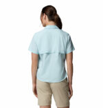 a women wearing a blue Silver Ridge Utility II Short Sleeve Shirt
