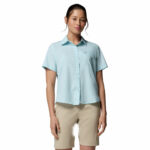 a women wearing a blue Silver Ridge Utility II Short Sleeve Shirt