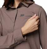 a women wearing a grey Silver Ridge II Utility Long Sleeve Shirt