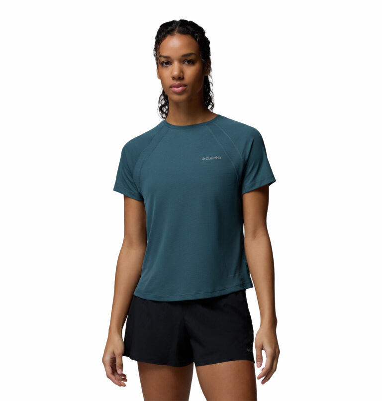 a women wearing a blue Stealth Spring Short Sleeve Tee