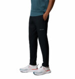 a man wearing a black Stealth Spring Pants