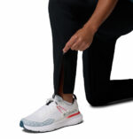a man wearing a black Stealth Spring Pants