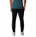a man wearing a black Stealth Spring Pants