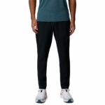 a man wearing a black Stealth Spring Pants