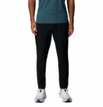 a man wearing a black Stealth Spring Pants