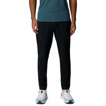 a man wearing a black Stealth Spring Pants