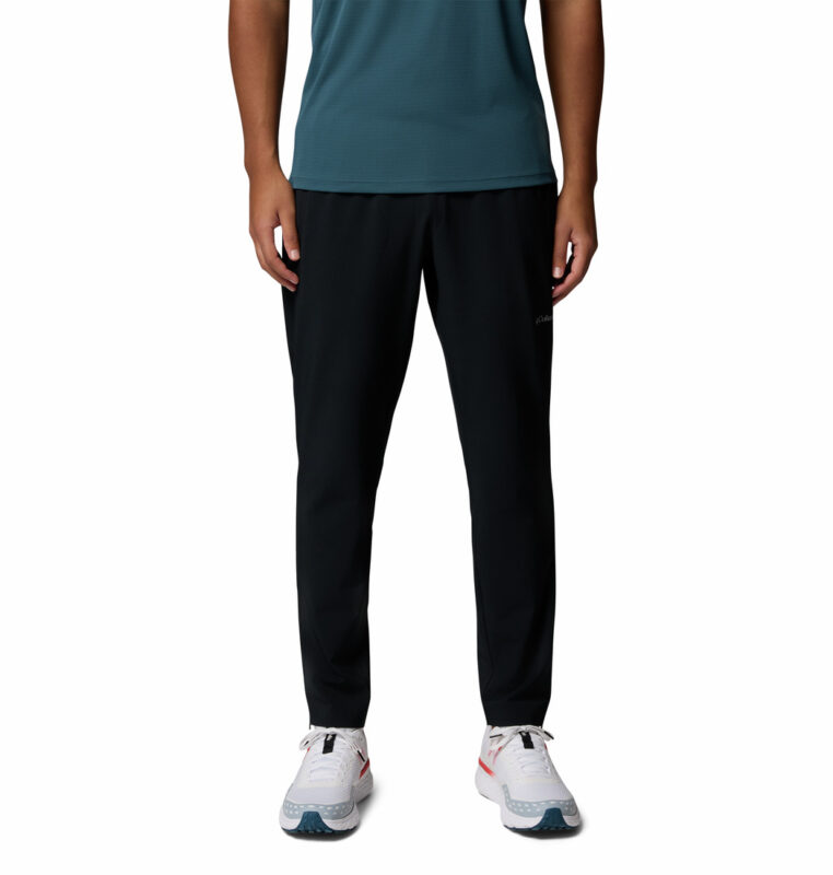 a man wearing a black Stealth Spring Pants