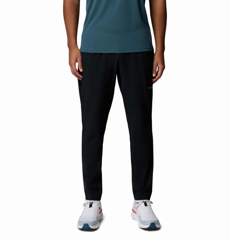 a man wearing a black Stealth Spring Pants