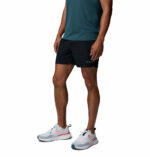 a man wearing black Stealth Spring Lined Shorts