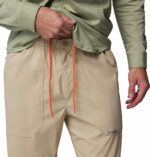 a man wearing a brown Landroamer Scout Pants