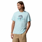 a man wearing a blue PFG Shield Short Sleeve T-Shirt