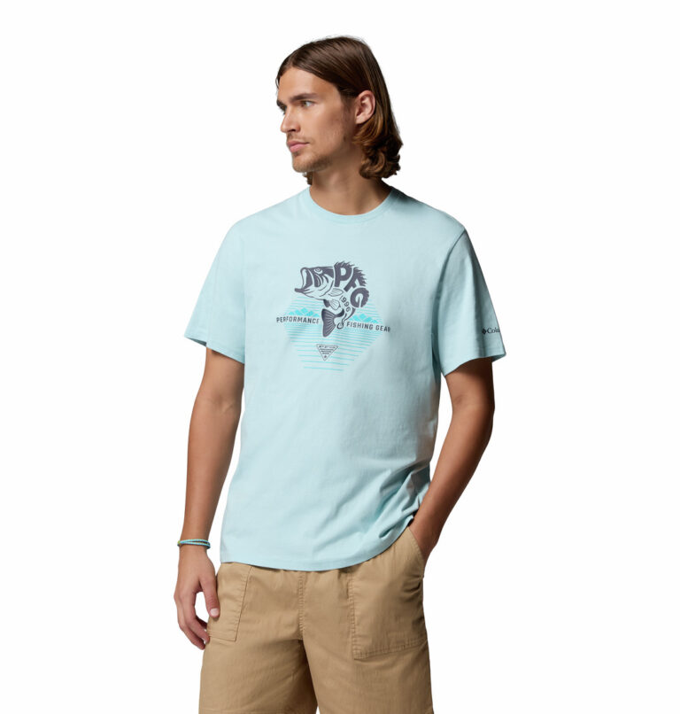 a man wearing a blue PFG Shield Short Sleeve T-Shirt