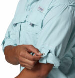 a man wearing a PFG Bahama II Long Sleeve Shirt