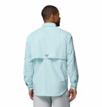 a man wearing a PFG Bahama II Long Sleeve Shirt