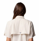 a women wearing a PFG Tamiami II Short Sleeve Shirt