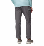a man wearing a grey PFG Terminal Roamer Stretch Pants