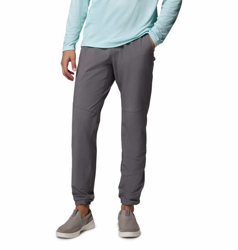 a man wearing a grey PFG Terminal Roamer Stretch Pants