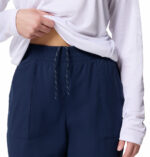 a women wearing PFG Tidal Roamer II Stretch Pants