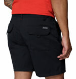 a man wearing Tech Trail Utility Shorts