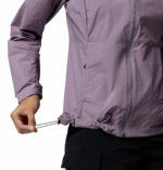 a women wearing a purple Loop Trail III Windbreaker