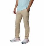 a man wearing Tech Trail Utility Pants