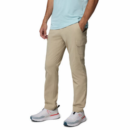a man wearing Tech Trail Utility Pants