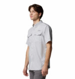 a man wearing a grey PFG Blood and Guts V Short Sleeve Shirt