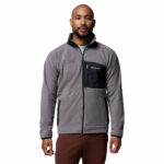a man wearing a Fast Trek Overlay Full Zip Fleece Jacket