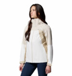 a women wearing a beige Inner Limits IV Jacket