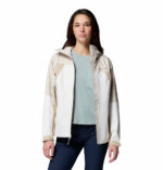 a women wearing a beige Inner Limits IV Jacket
