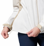 a women wearing a beige Inner Limits IV Jacket