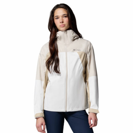 a women wearing a beige Inner Limits IV Jacket
