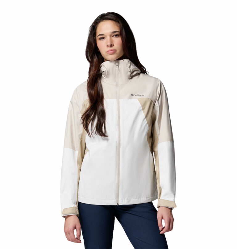 a women wearing a beige Inner Limits IV Jacket