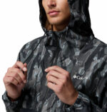 a man wearing a black camo Spore Valley Novelty Windbreaker Jacket